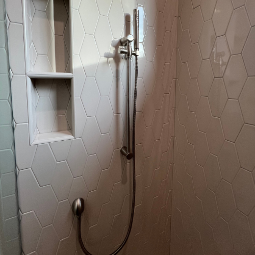 showroom shower photo, tile, shelves 